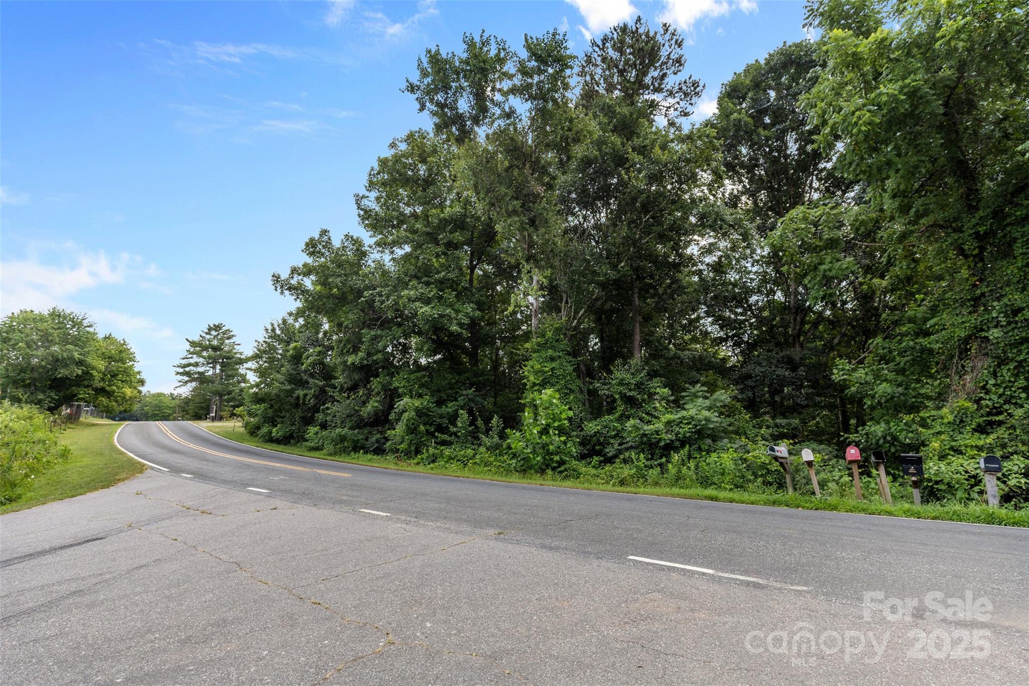 0 Liberty Church Road Hickory, NC 28601 - Photo 5 of 11 a view of a road with a trees in the background