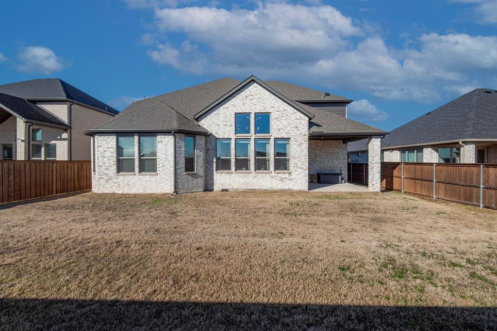 16650 Nightshade Road Frisco, TX 75033 - Photo 36 of 40 front view of a house with a yard