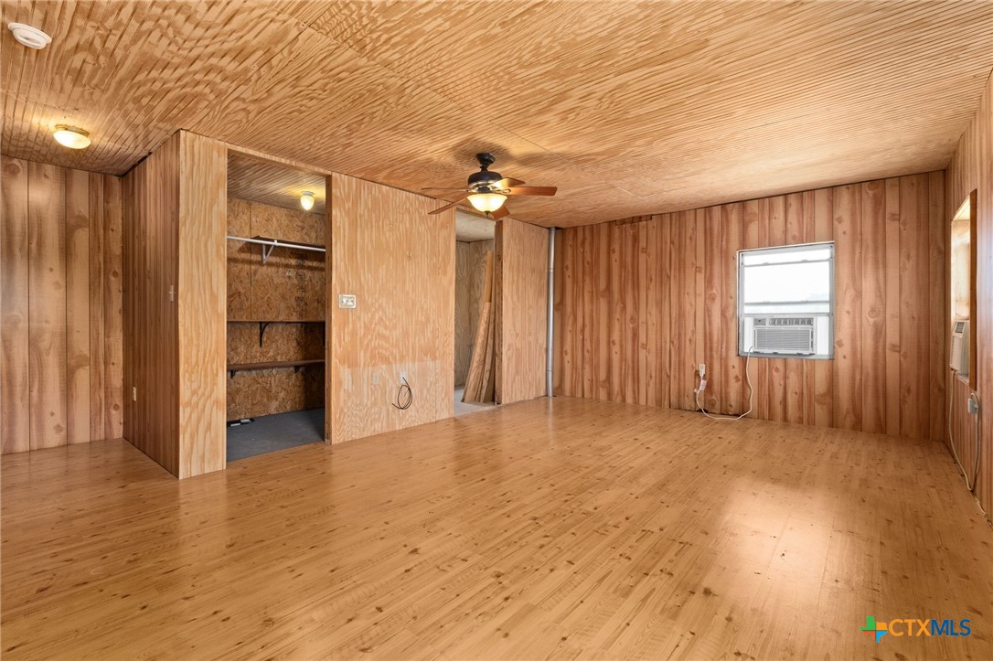 586 Private Road 3448 Kempner, TX 76539 - Photo 18 of 40 an empty room with closet and windows