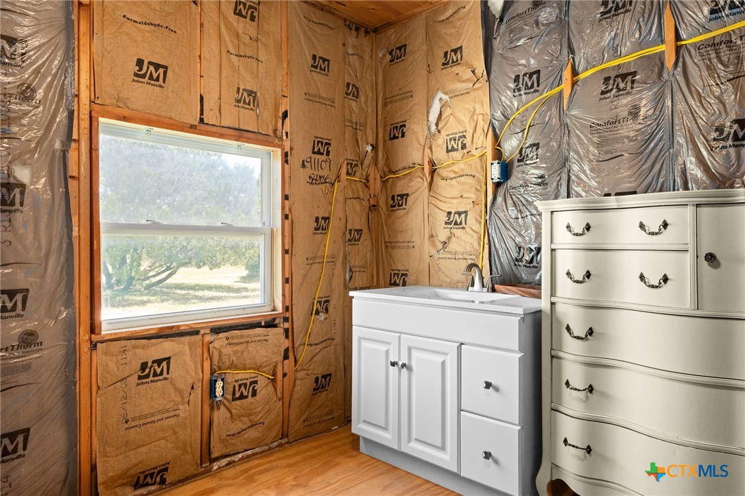 586 Private Road 3448 Kempner, TX 76539 - Photo 23 of 40 a kitchen with stainless steel appliances granite countertop a refrigerator and a stove