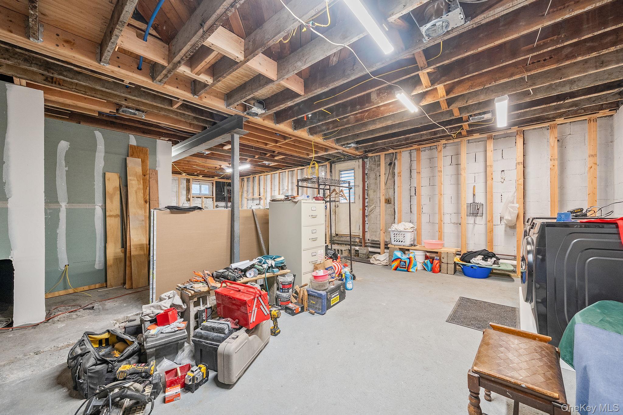181 Walnut Street Lynbrook, NY 11563 - Photo 27 of 46 Unfinished below grade area featuring washer / clothes dryer