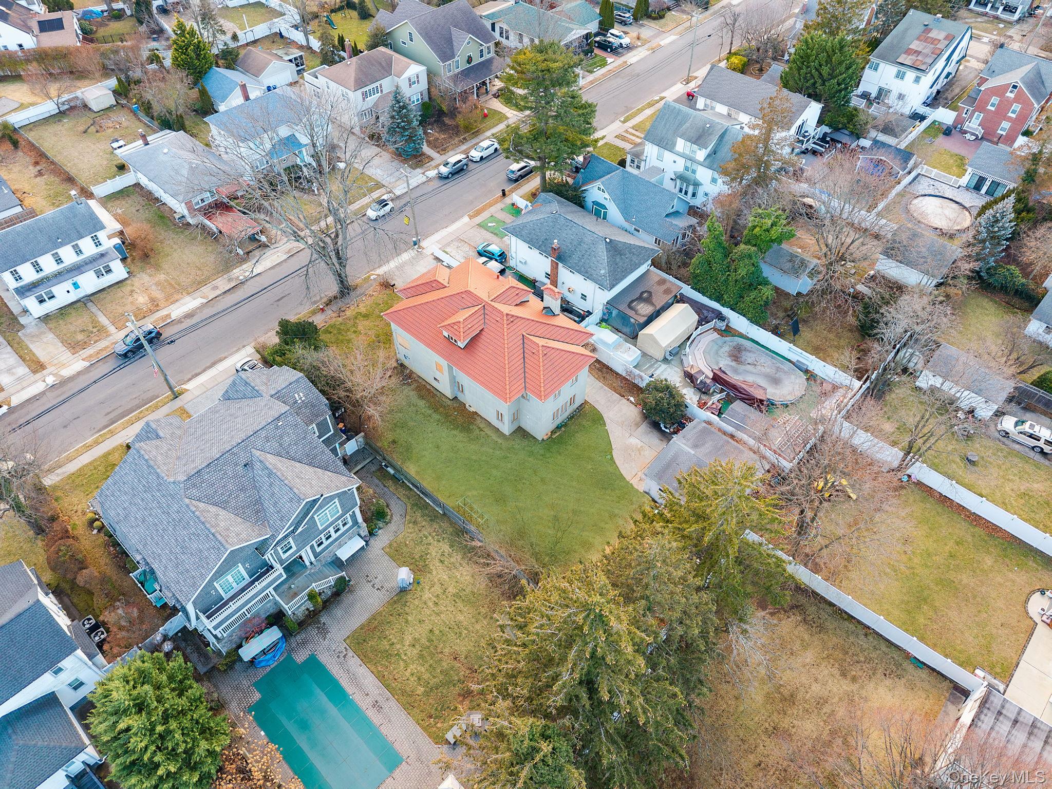 181 Walnut Street Lynbrook, NY 11563 - Photo 37 of 46 Aerial perspective of suburban area