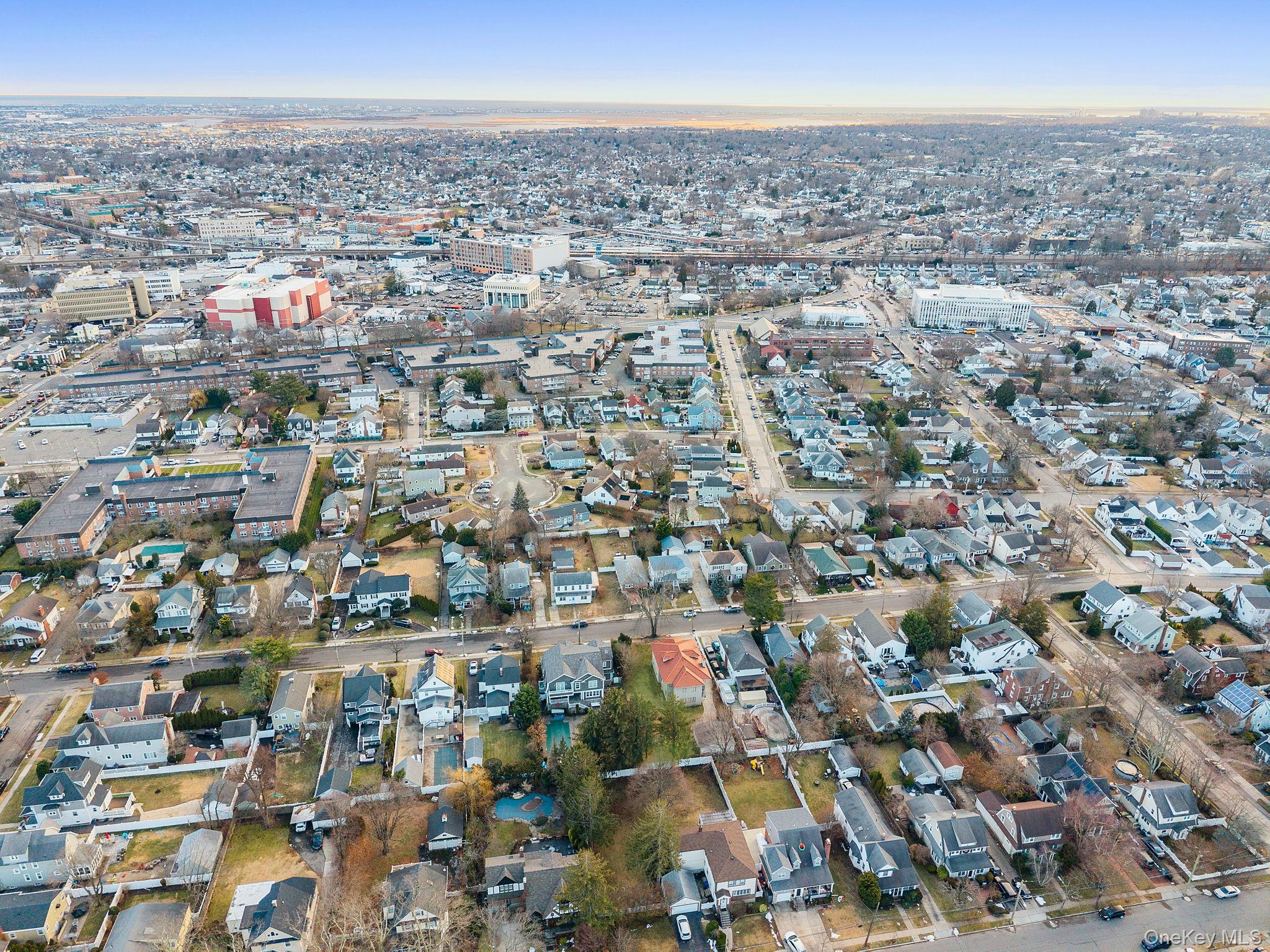 181 Walnut Street Lynbrook, NY 11563 - Photo 40 of 46 Aerial view of property and surrounding area featuring nearby urban area