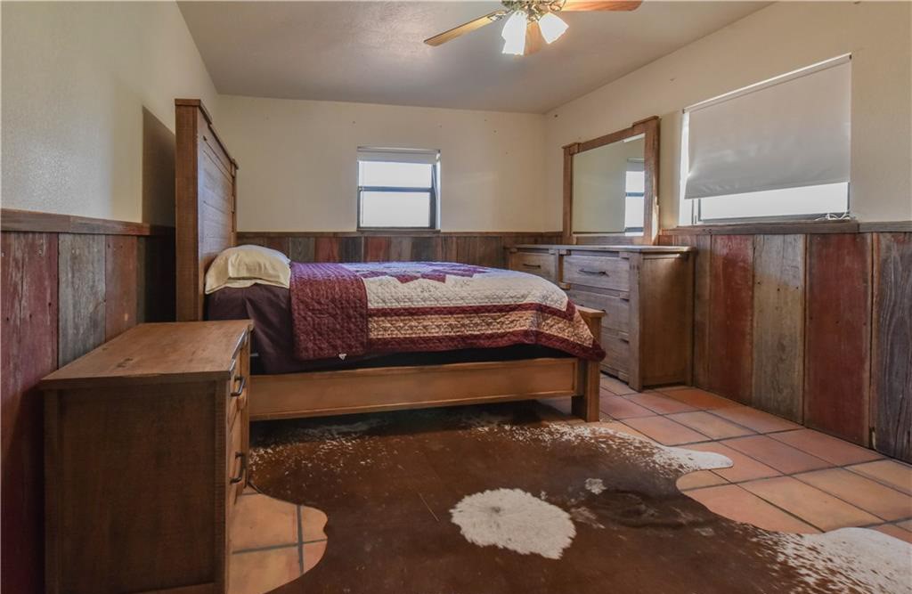 12200 Winn Road Franklin, TX 77856 - Photo 10 of 33 a bed room with a bed and a window