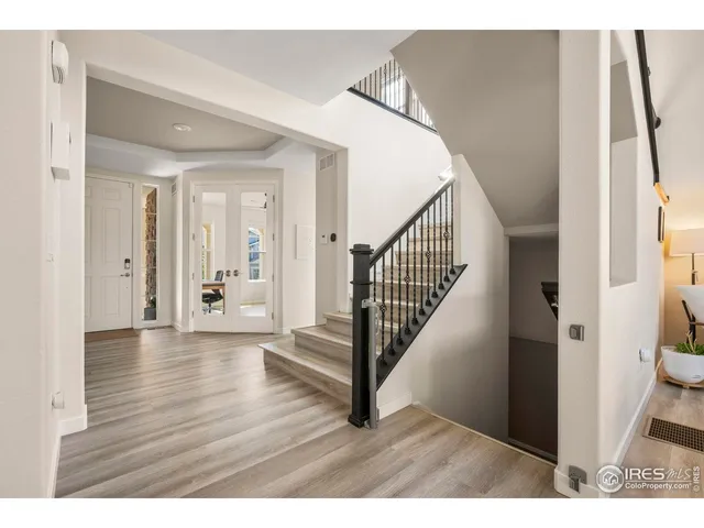 a view interior of a house with wooden floor and stairs