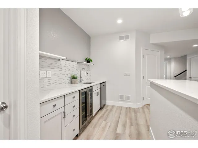 a bathroom with a sink a mirror and a bathtub