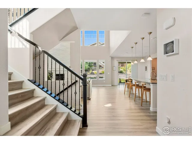 a view interior of a house and dining room with wooden floor