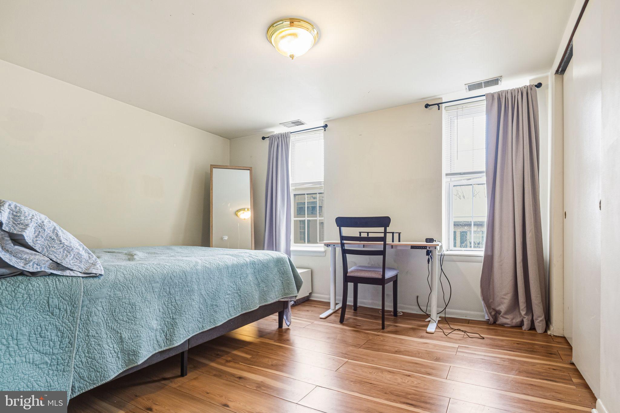 788 South 2nd Street, Unit 3 Philadelphia, PA 19147 - Photo 9 of 13 a bedroom with a bed and a window