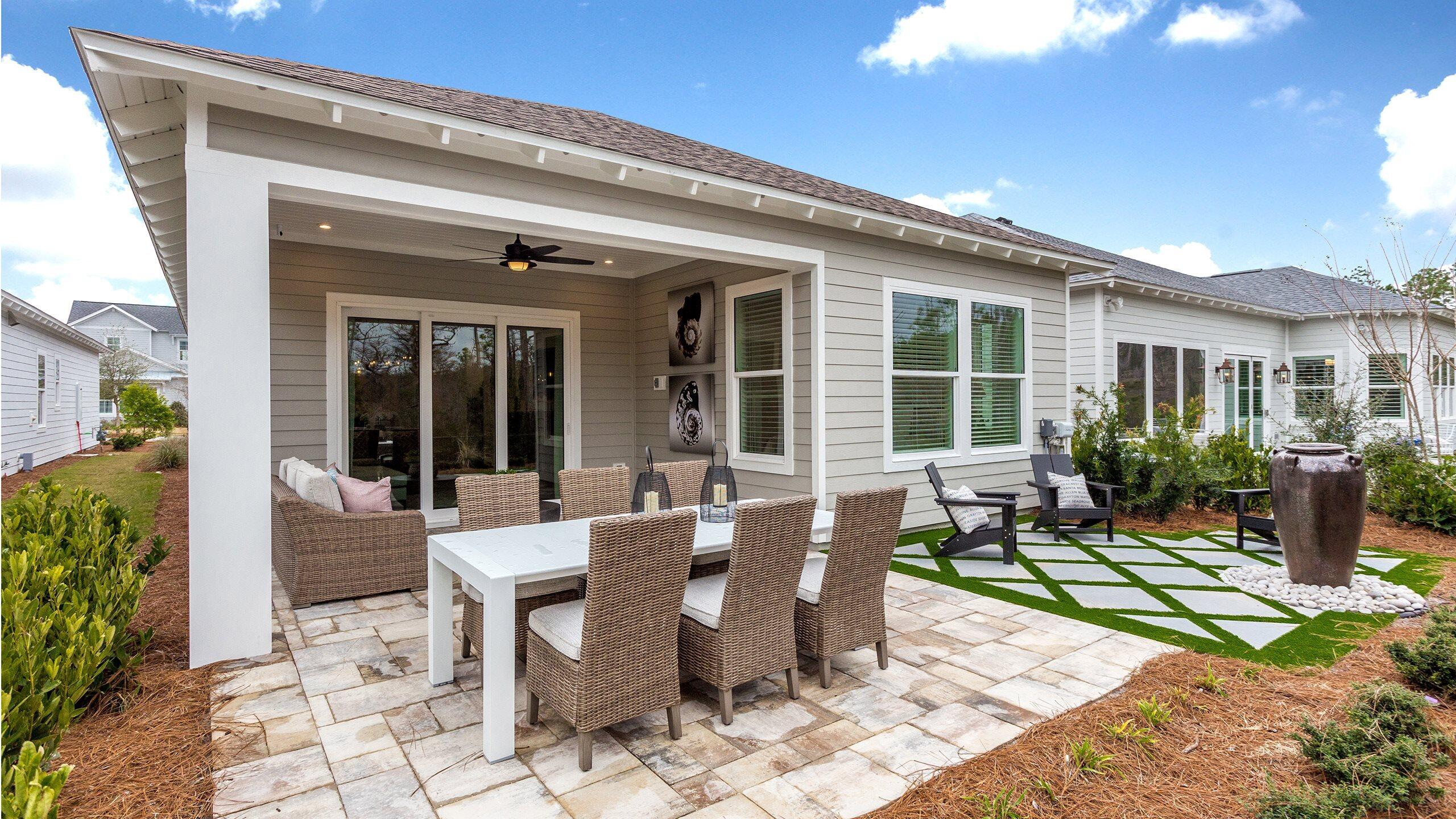 1659 Pathways Dr Inlet Beach Inlet Beach, FL 32461 - Photo 14 of 30 a view of a patio with table and chairs and potted plants