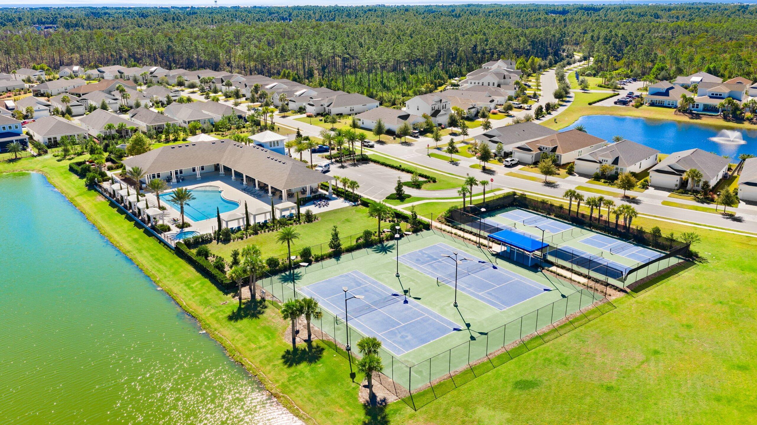 1659 Pathways Dr Inlet Beach Inlet Beach, FL 32461 - Photo 23 of 30 an aerial view of a house with a garden and lake view