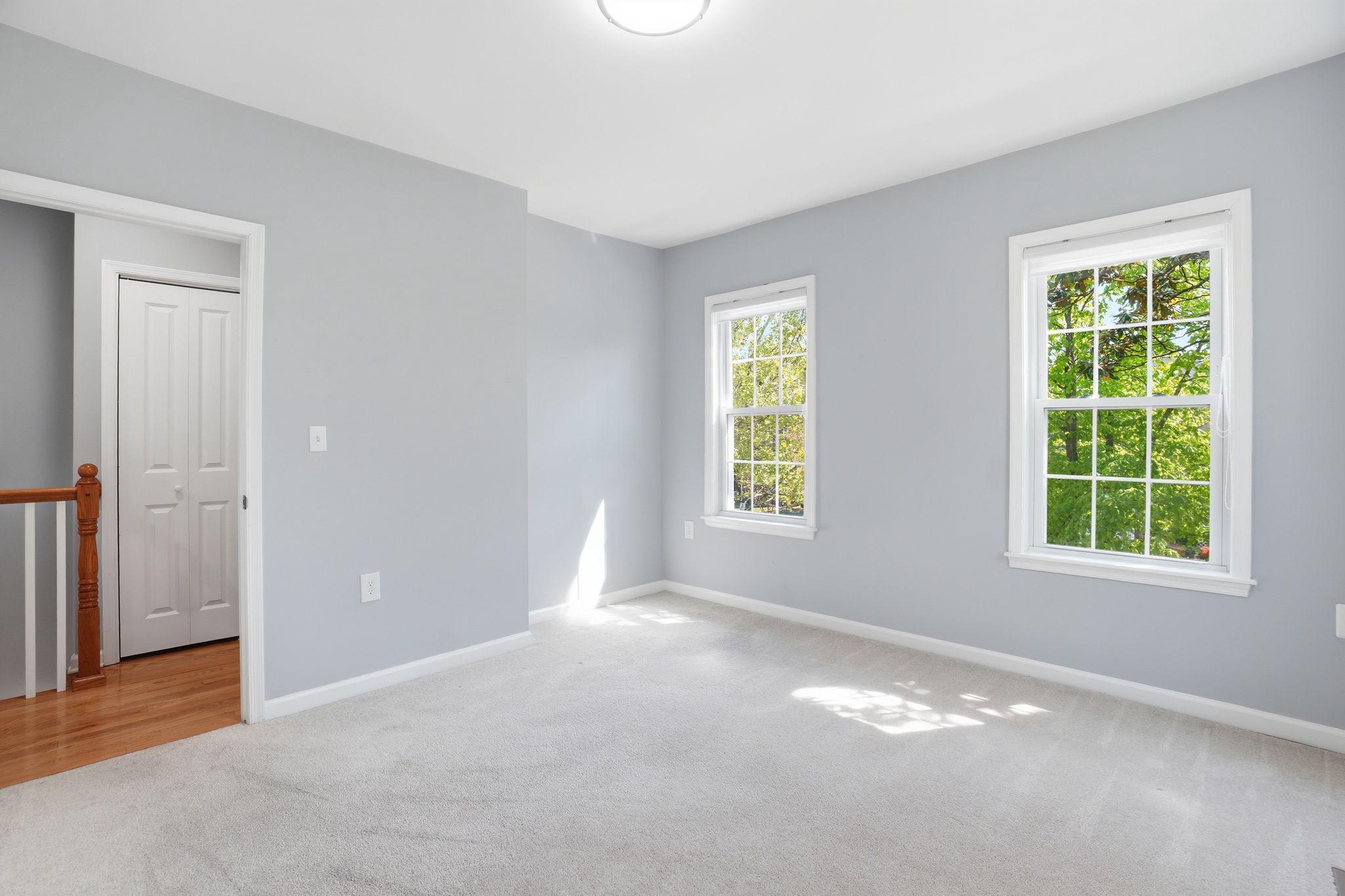 3337 5th Street Southeast Washington, DC 20032 - Photo 23 of 31 an empty room with windows and closet