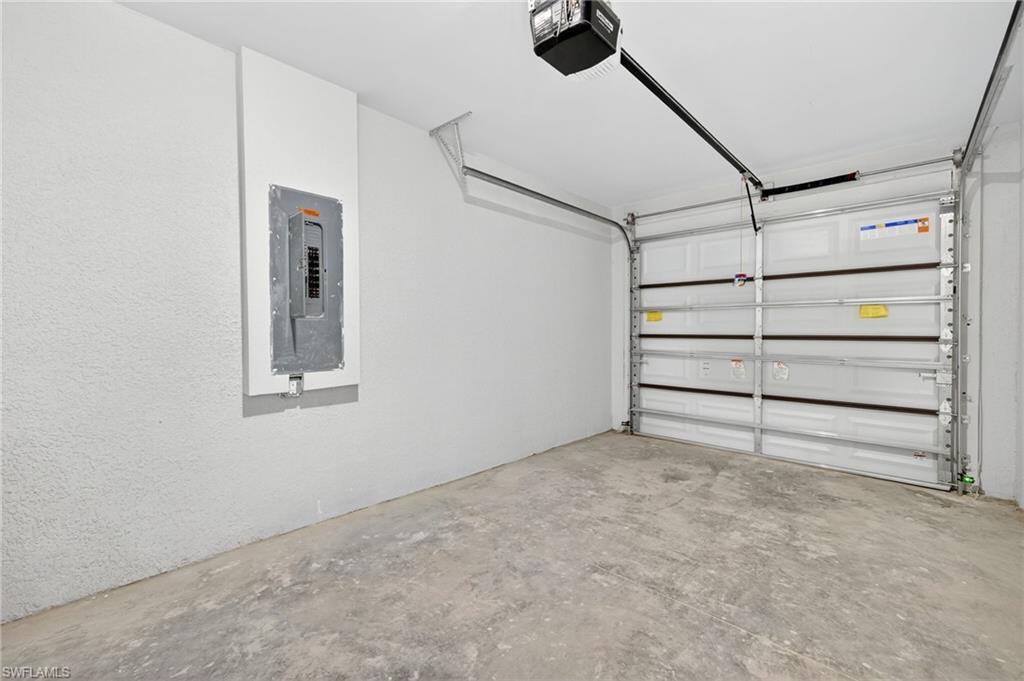 321 Ranier Avenue Lehigh Acres, FL 33974 - Photo 24 of 40 a view of an empty room with a empty space