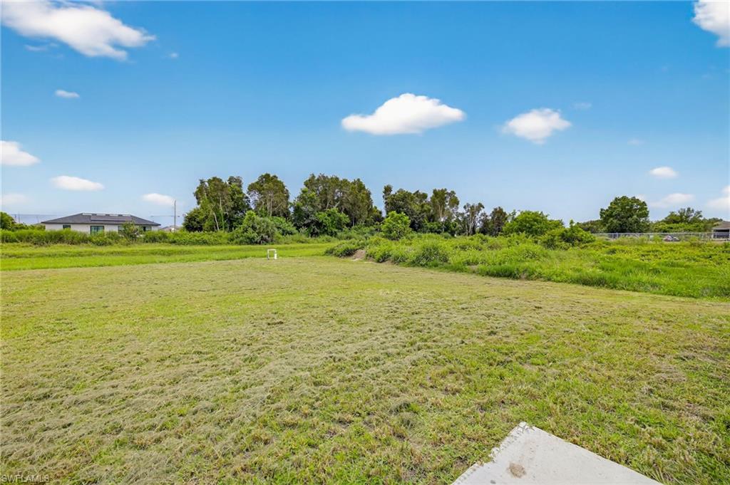 321 Ranier Avenue Lehigh Acres, FL 33974 - Photo 28 of 40 a view of an ocean and a building