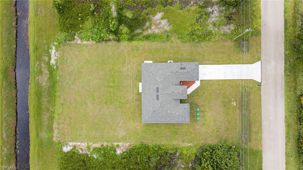 321 Ranier Avenue Lehigh Acres, FL 33974 - Photo 34 of 40 view of a balcony with an ocean view
