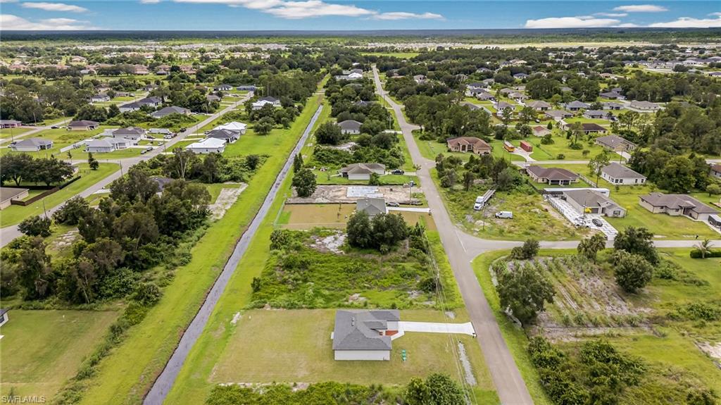 321 Ranier Avenue Lehigh Acres, FL 33974 - Photo 37 of 40 a view of a city