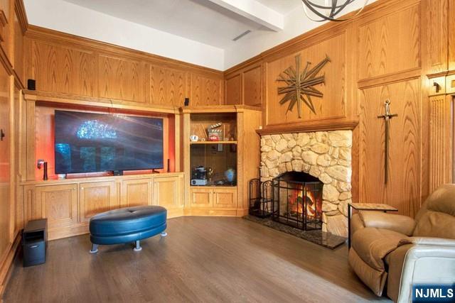 99 Ogle Road Old Tappan, NJ 07675 - Photo 11 of 50 a living room with furniture and a fireplace