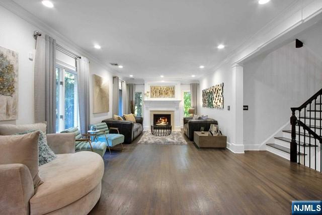 99 Ogle Road Old Tappan, NJ 07675 - Photo 13 of 50 a living room with furniture and a fireplace
