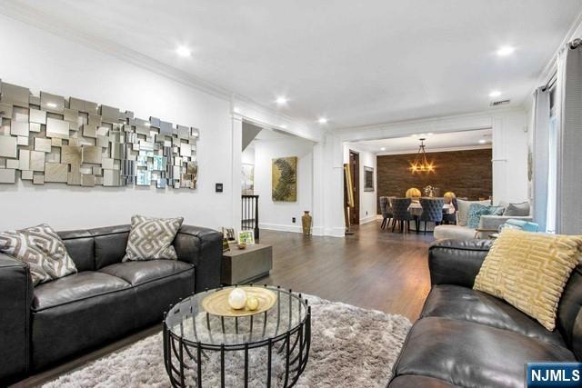 99 Ogle Road Old Tappan, NJ 07675 - Photo 16 of 50 a living room with furniture and a large window
