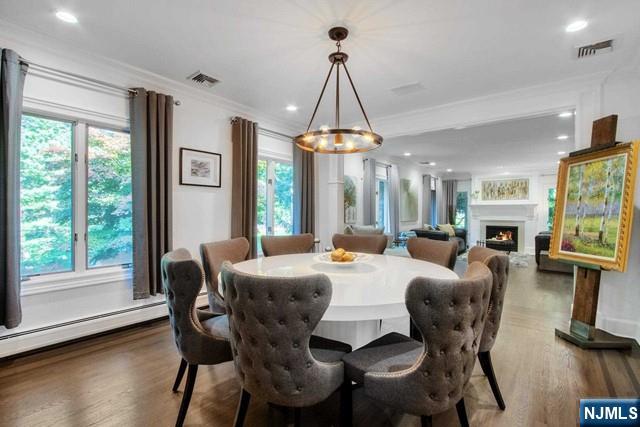 99 Ogle Road Old Tappan, NJ 07675 - Photo 17 of 50 a view of a dining room with furniture window and wooden floor