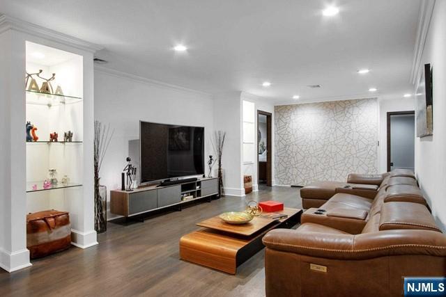 99 Ogle Road Old Tappan, NJ 07675 - Photo 28 of 50 a living room with furniture and a flat screen tv