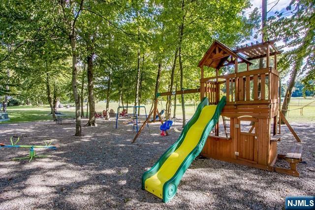 99 Ogle Road Old Tappan, NJ 07675 - Photo 48 of 50 a view of a park with a slide
