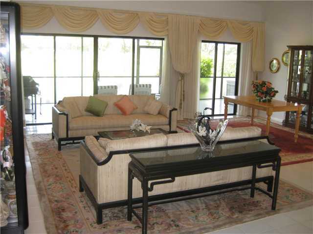 8548 Eagle Run Drive Boca Raton, FL 33434 - Photo 11 of 30 a living room with furniture and a window