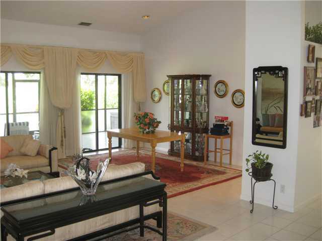 8548 Eagle Run Drive Boca Raton, FL 33434 - Photo 12 of 30 a living room with furniture and a window