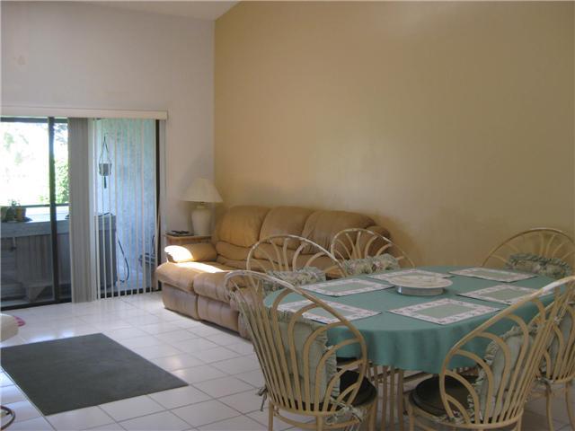 8548 Eagle Run Drive Boca Raton, FL 33434 - Photo 16 of 30 a view of a dining room with furniture