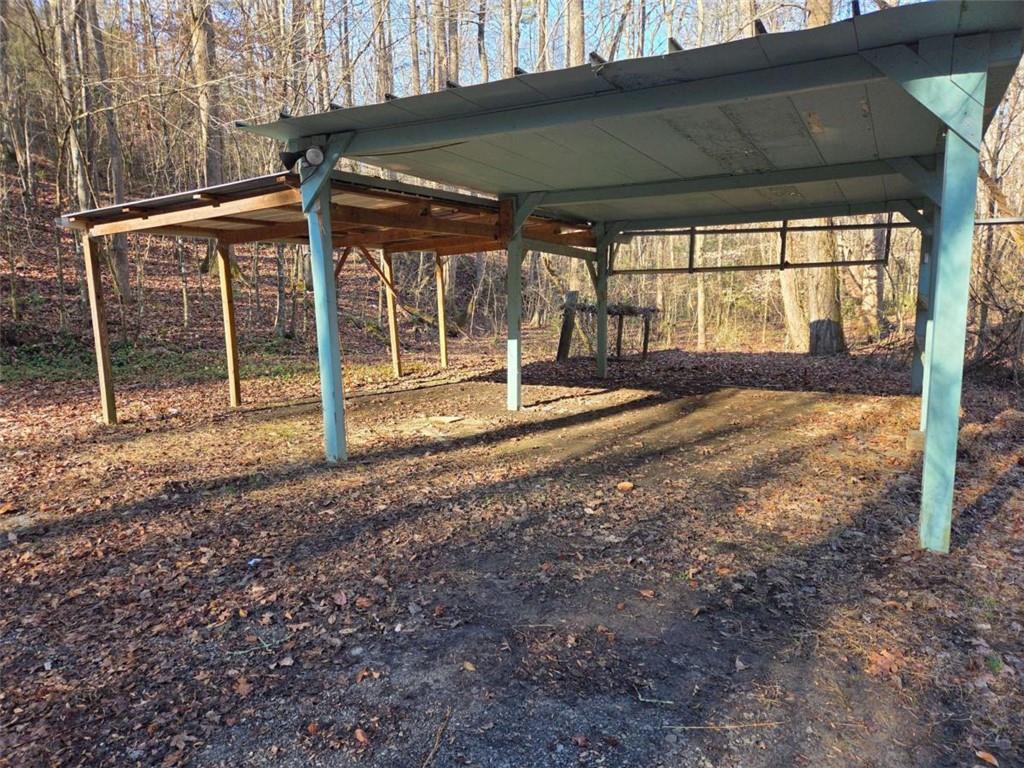 408 Apple Ridge 1 Dawsonville, GA 30534 - Photo 6 of 35 a backyard of a house with wooden floor and outdoor seating