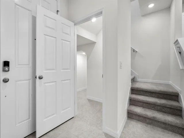 a view of an entryway with hallway