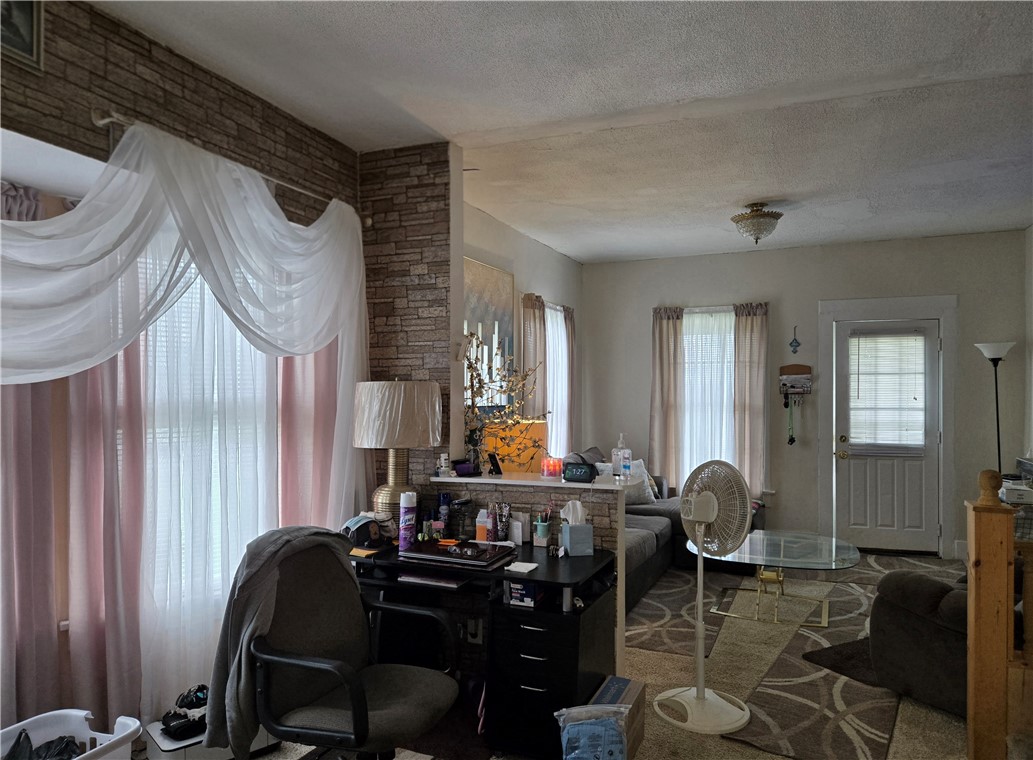 695-697 Culver Road Rochester, NY 14609 - Photo 29 of 50 The dining room here is currently being used as an home office/gym.