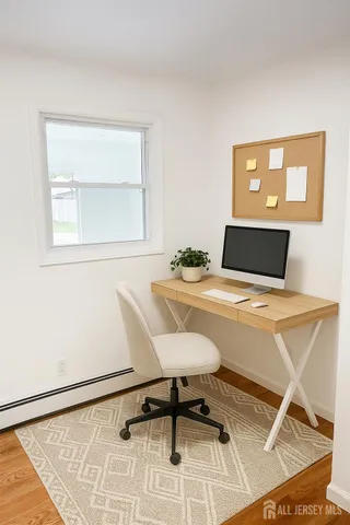 a bedroom with a bed and a table in it