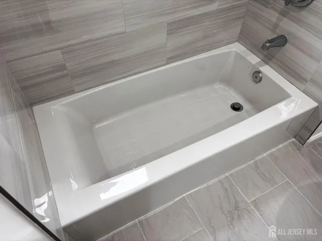 a bathroom with a tub