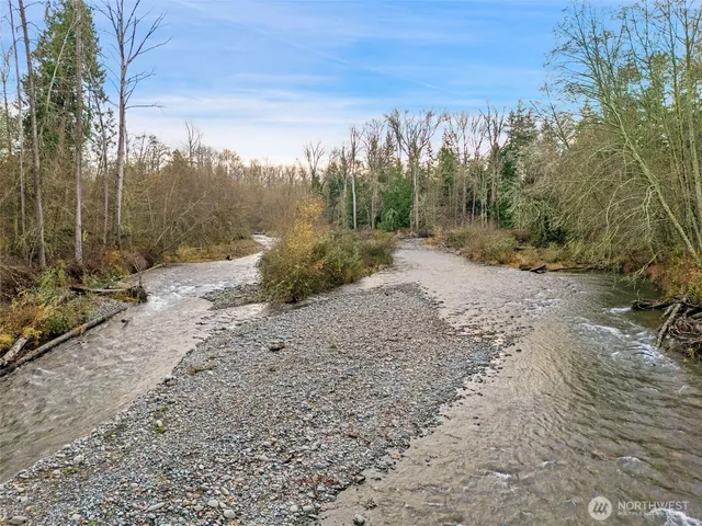 a aerial view of a house with a yard