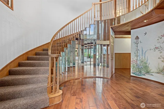 a view of entryway with wooden floor