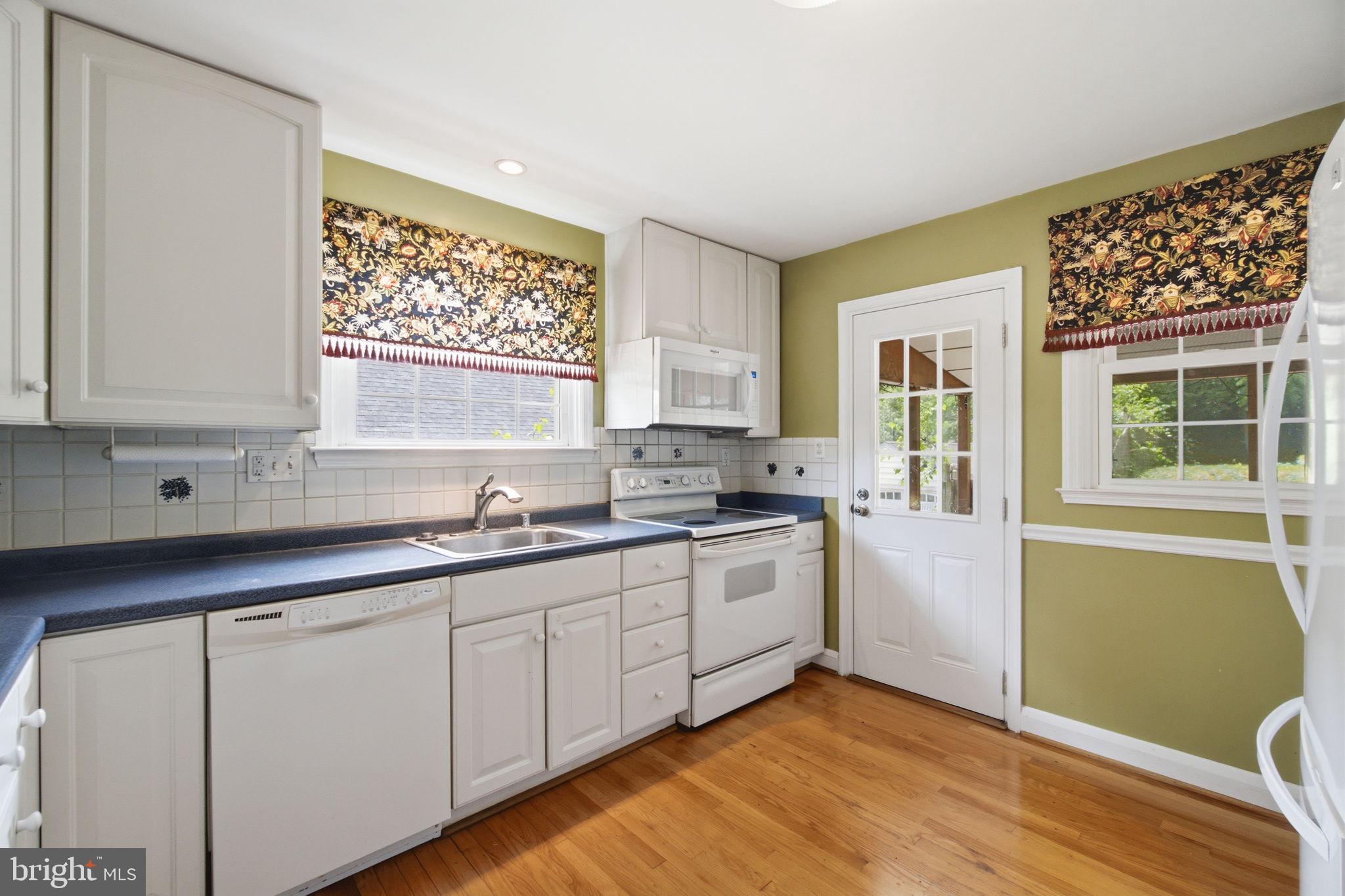107 Oakway Road Lutherville-Timonium, MD 21093 - Photo 8 of 52 Kitchen with access to the screened in porch