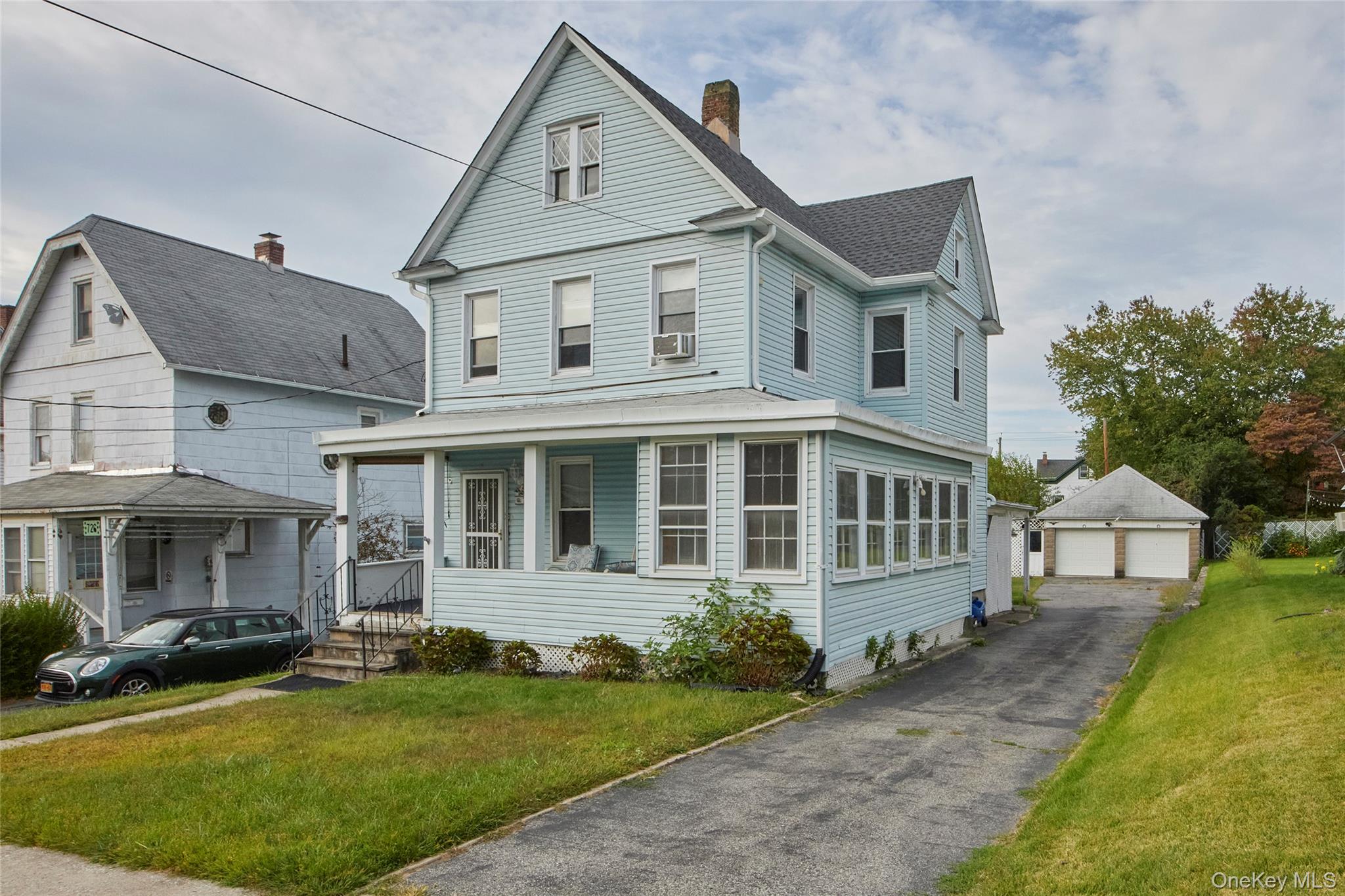 728 Frost Avenue Peekskill, NY 10566 - Photo 1 of 18 a view of a yard in front of house
