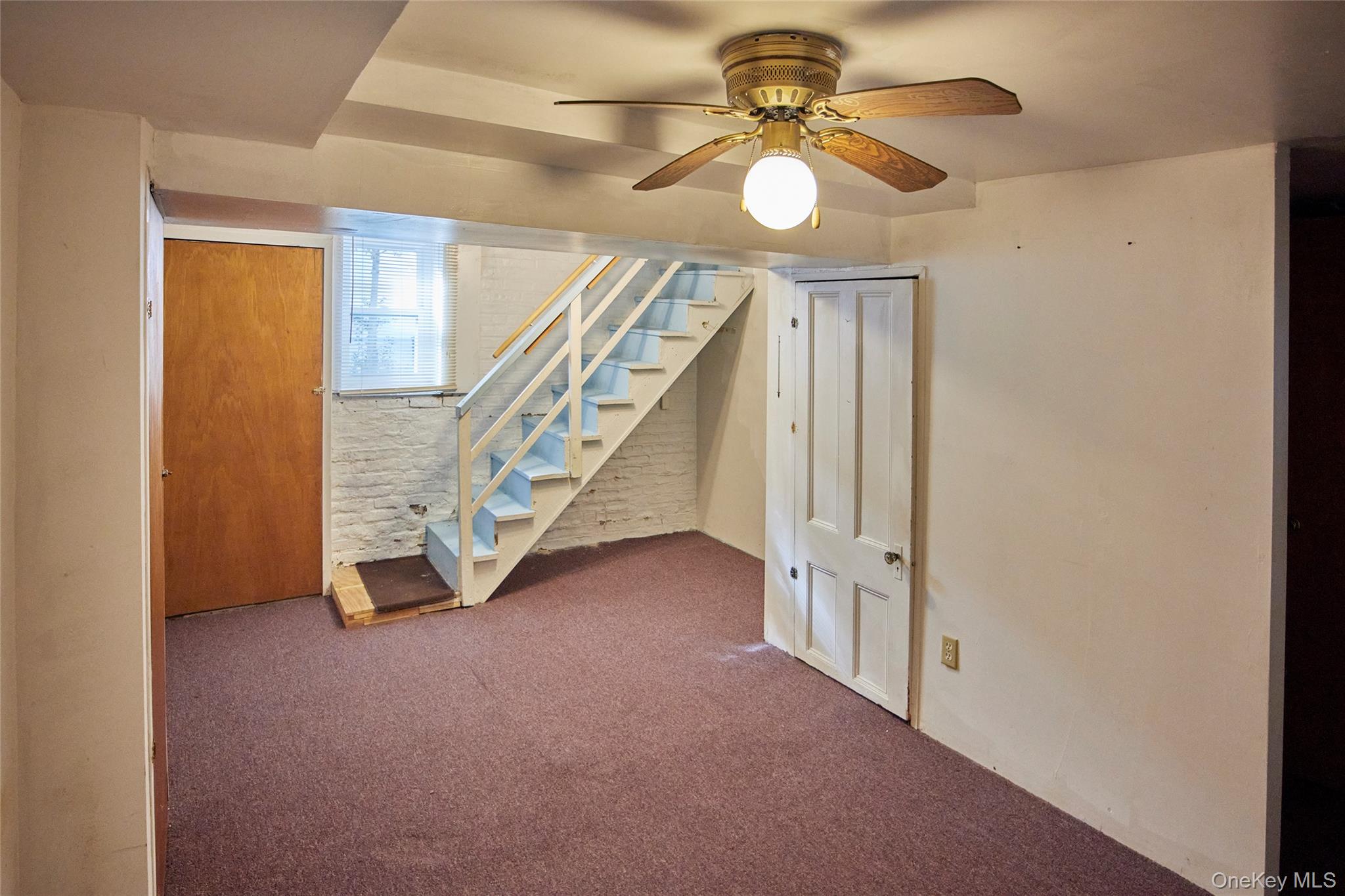728 Frost Avenue Peekskill, NY 10566 - Photo 15 of 18 an empty room with windows and fan