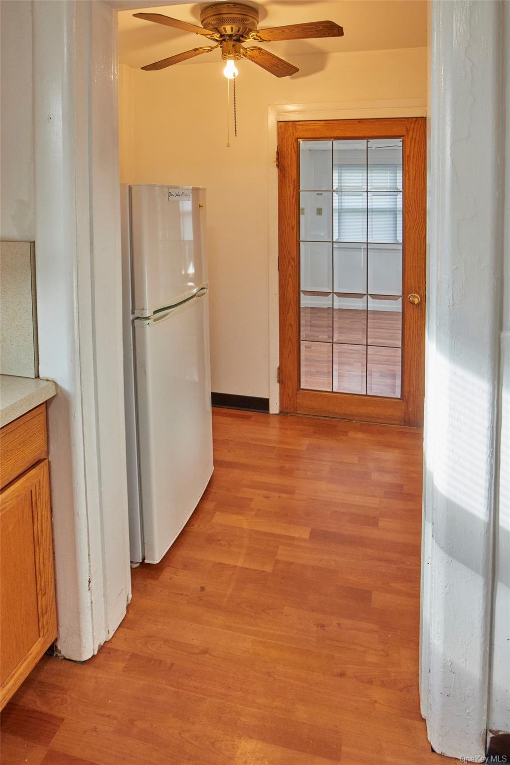 728 Frost Avenue Peekskill, NY 10566 - Photo 4 of 18 a view of an empty room with a window