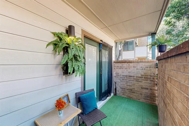 a backyard of a house with seating space