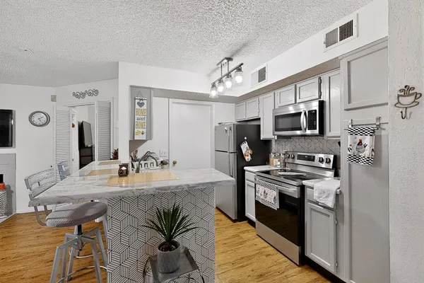 $157,000 | 2311 Basil Drive, Unit C103, Arlington, TX 76006