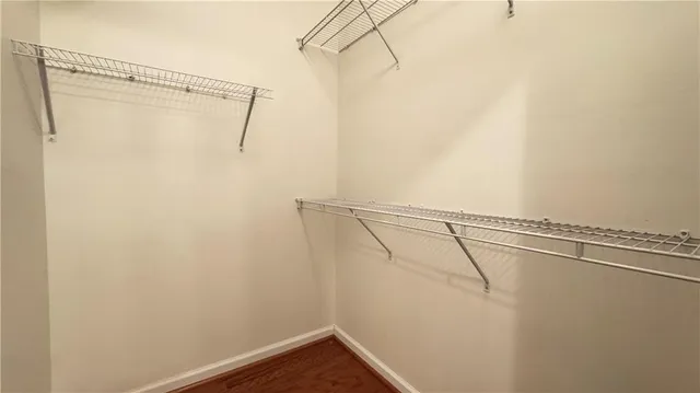 a view of a room with racks on the wall