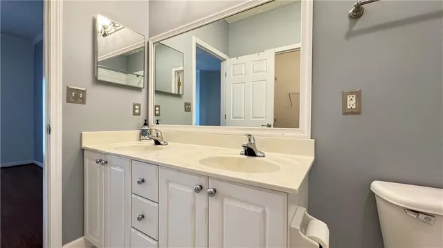 a bathroom with a sink and a toilet