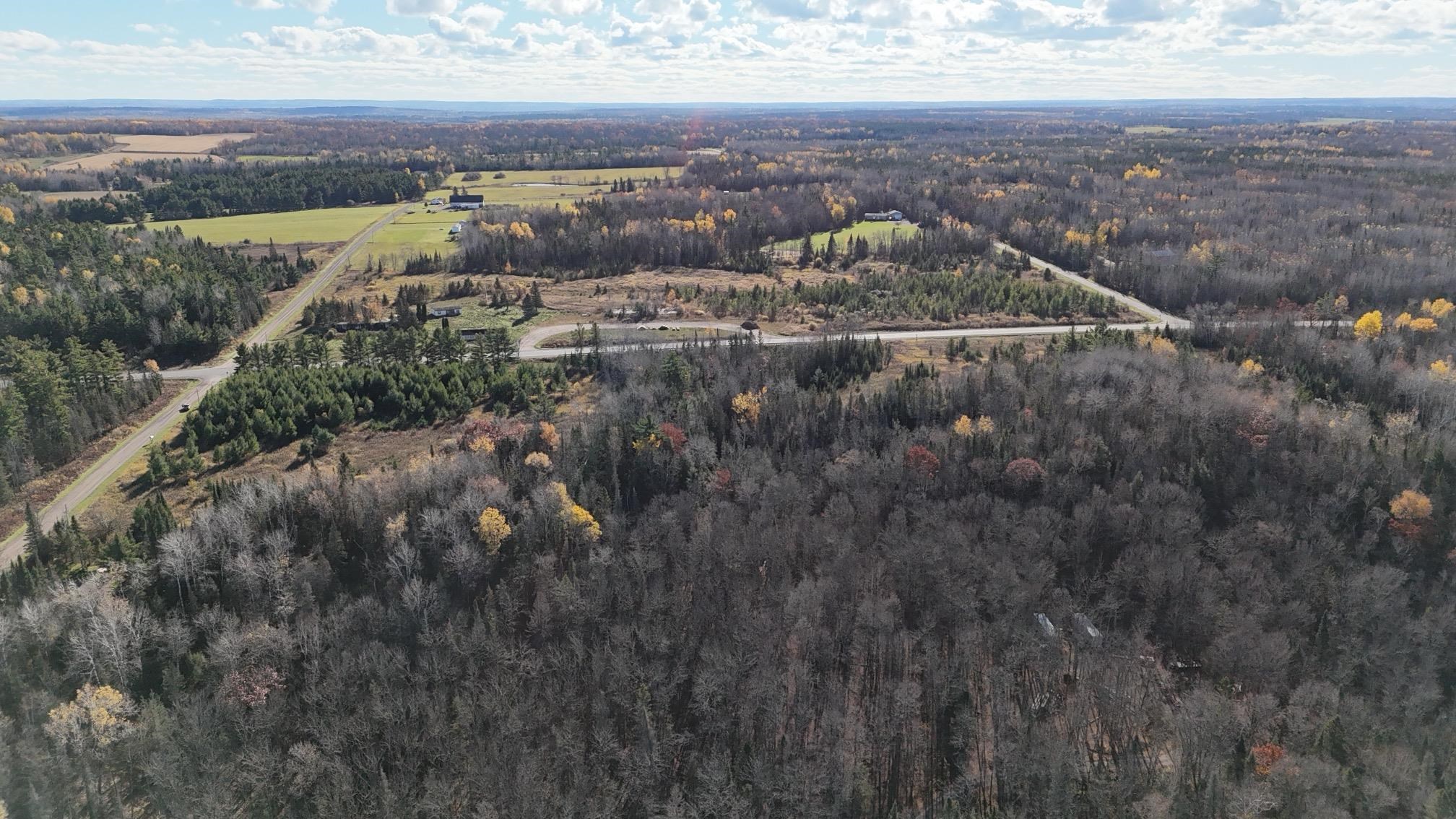 2 U.S. Highway 2 Ashland, WI 54806 - Photo 10 of 10 Aerial view of property's location with a heavily wooded area