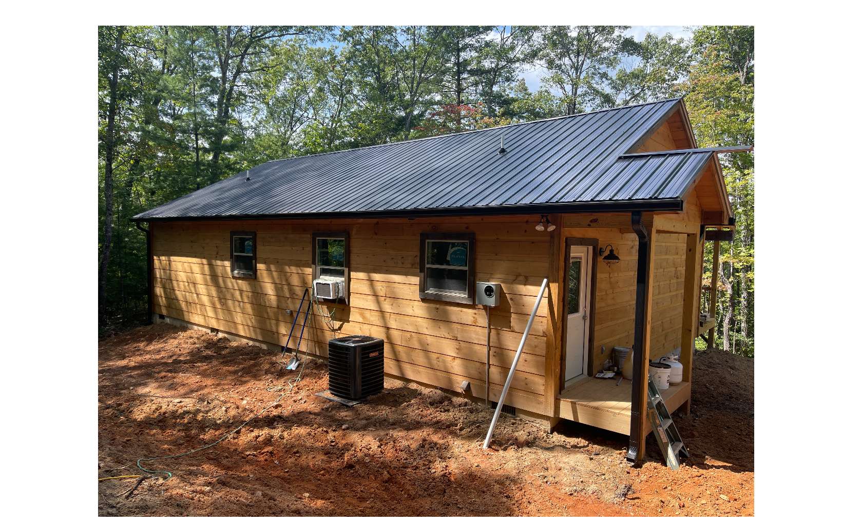 504 Rye Field Road Murphy, NC 28906 - Photo 1 of 16 a front view of a house with garden