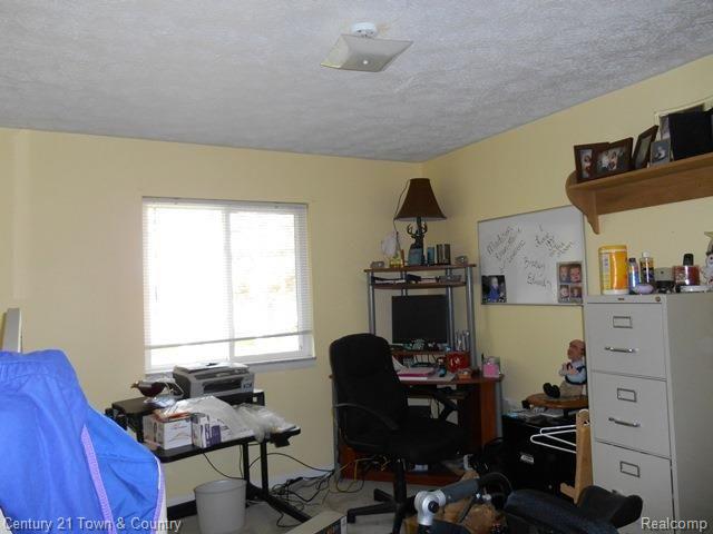 6737 Rickett Road Brighton, MI 48116 - Photo 11 of 23 BEDROOM 3.jpg