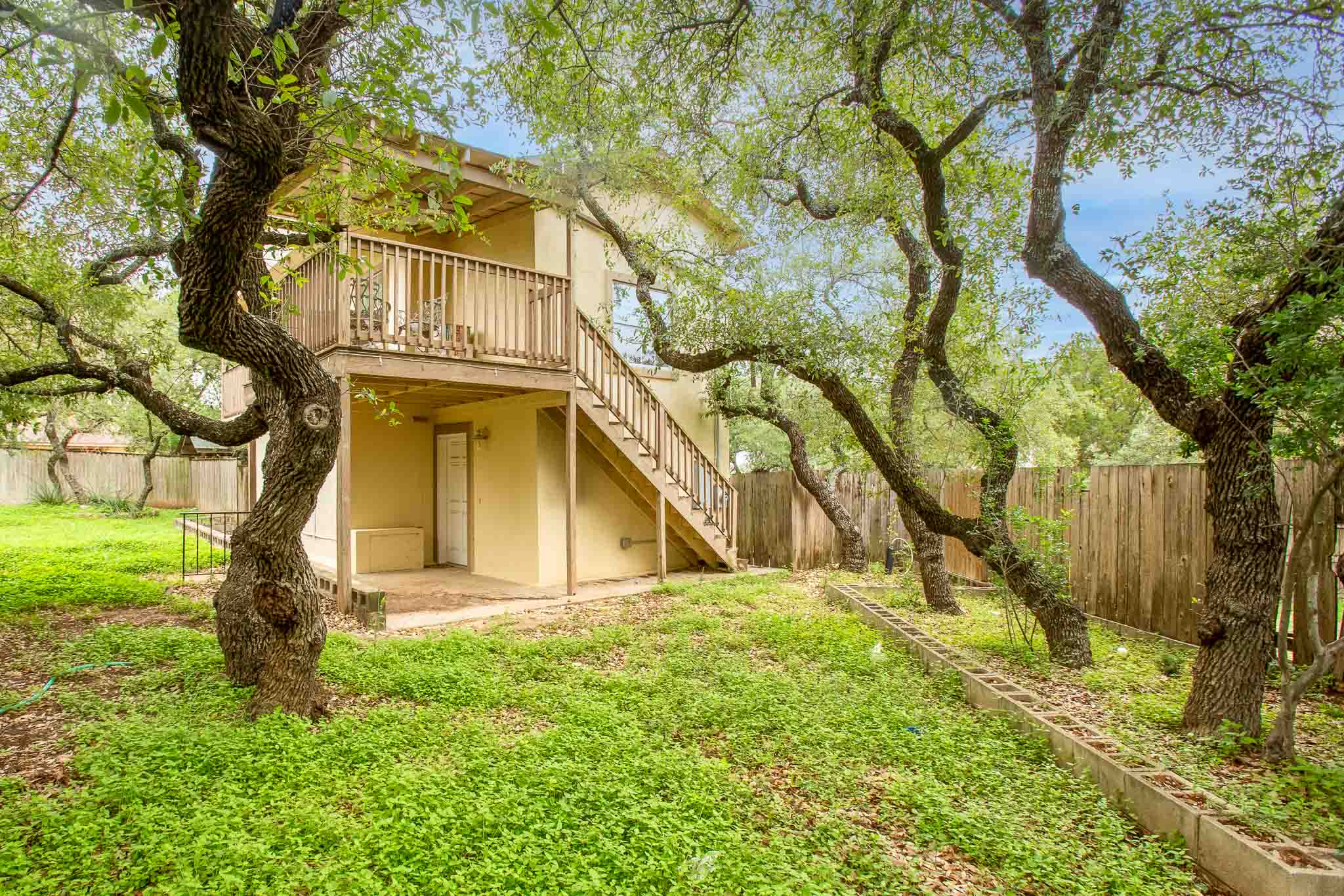4525 Bell Springs Road Dripping Springs, TX 78620 - Photo 11 of 39 a view of a yard in front of the house