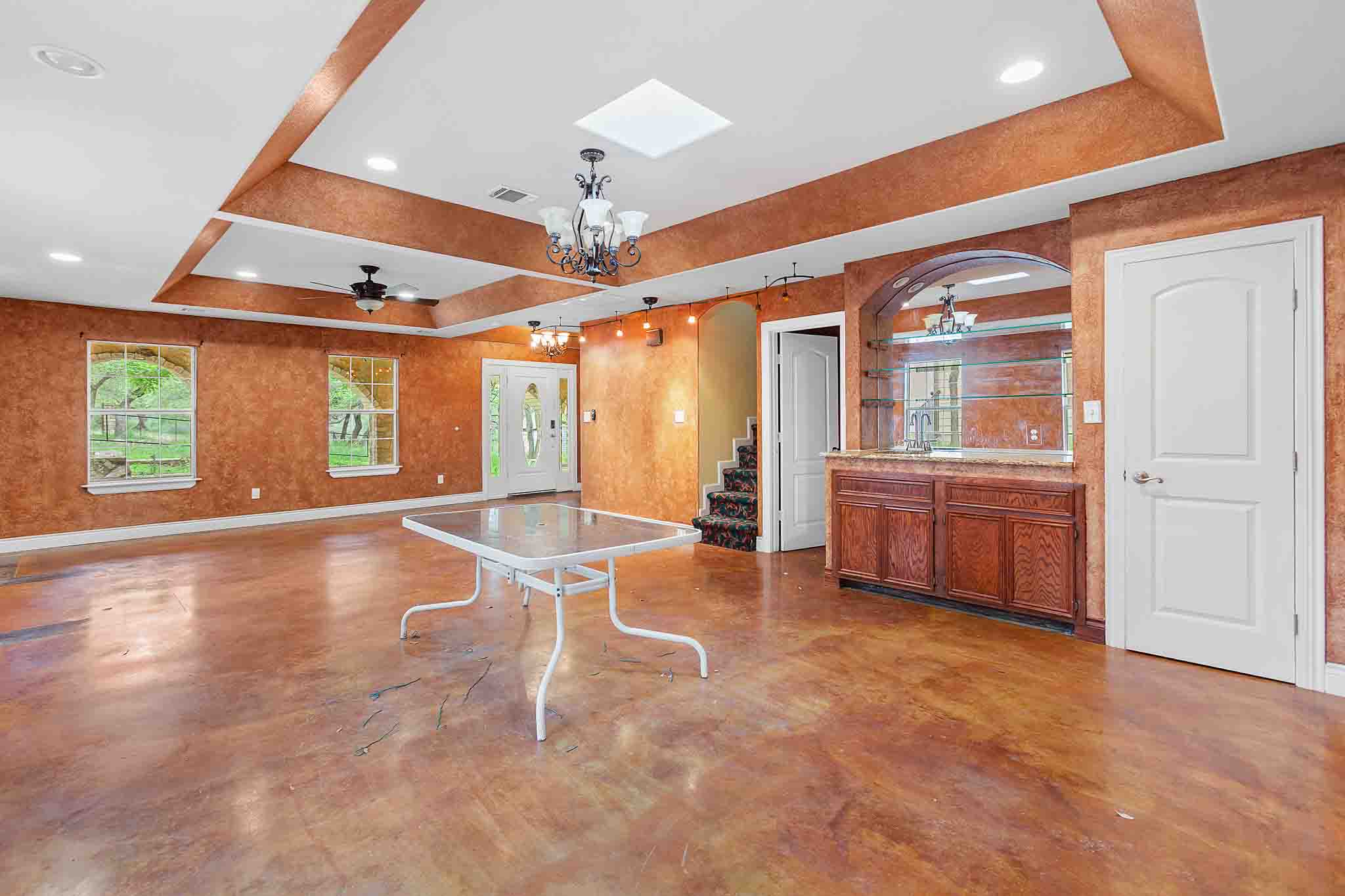 4525 Bell Springs Road Dripping Springs, TX 78620 - Photo 15 of 39 an empty room with windows and ceiling fan