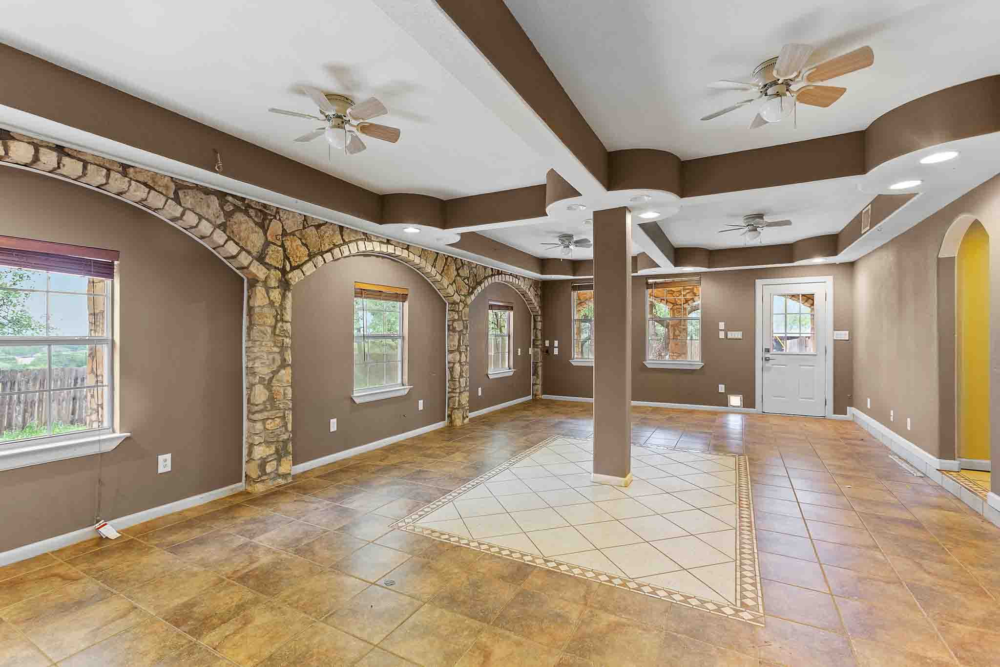 4525 Bell Springs Road Dripping Springs, TX 78620 - Photo 18 of 39 a view of a hallway with the glass door