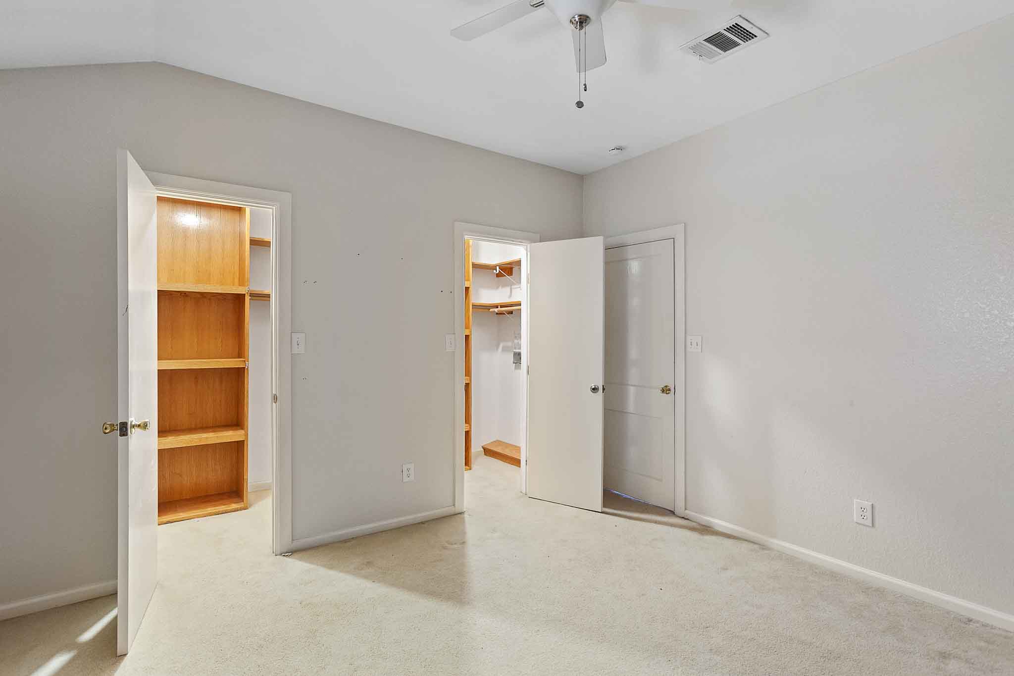 4525 Bell Springs Road Dripping Springs, TX 78620 - Photo 26 of 39 an empty room with closet and windows